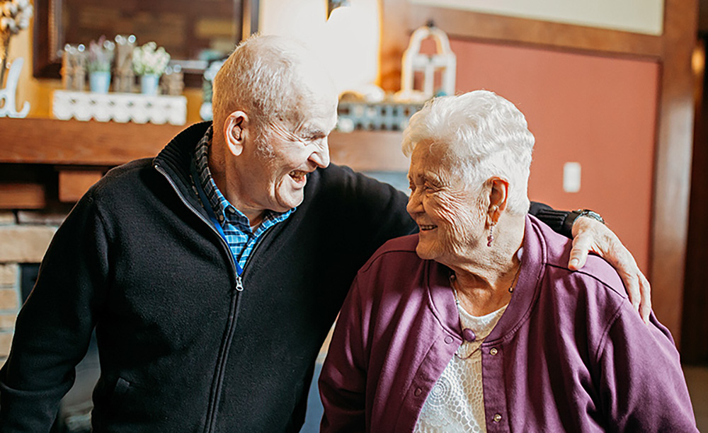 At Auburn Meadows in Waconia, a couple lovingly look at one another